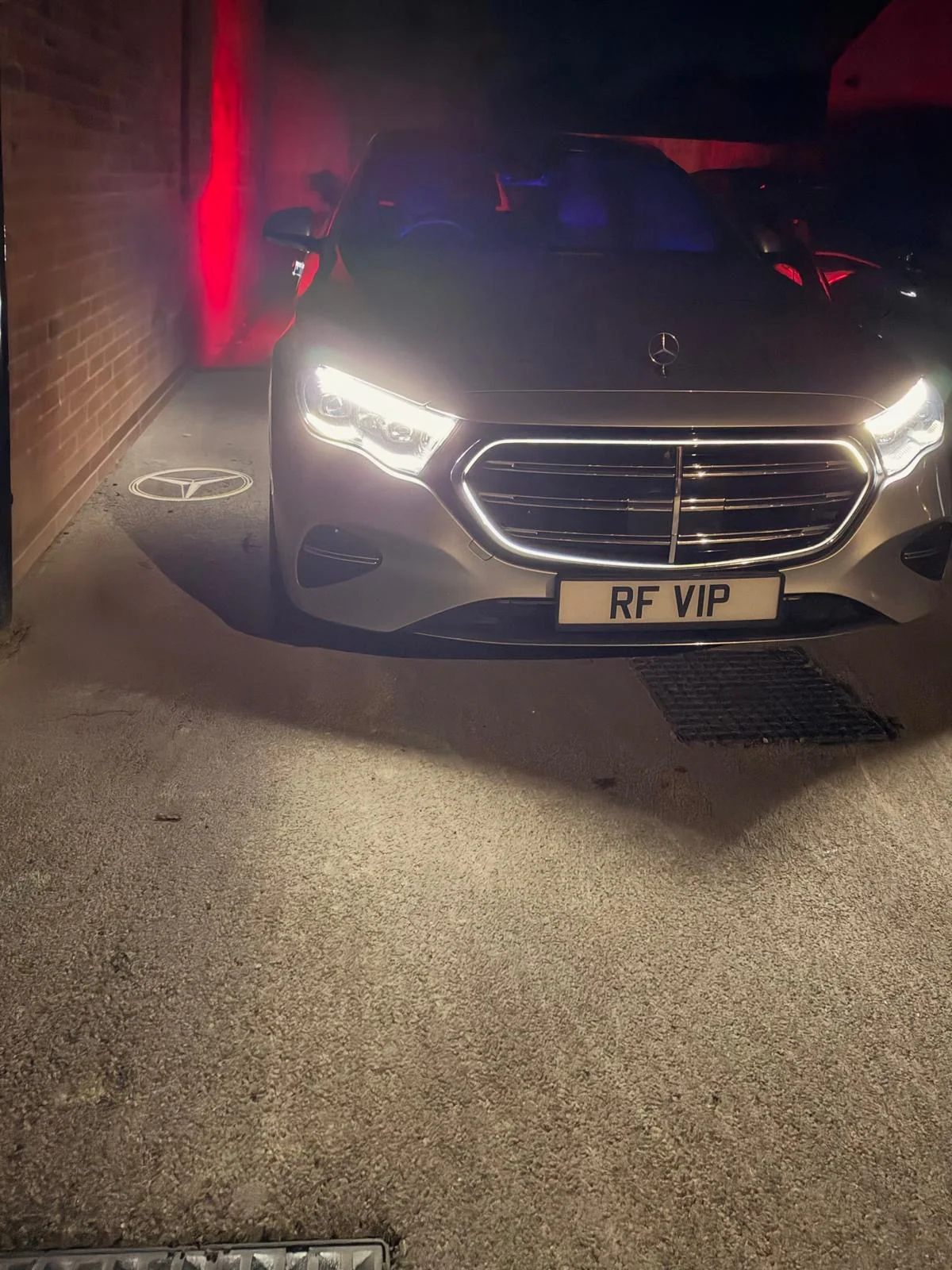 The RF Mercedes-Benz at night with its illuminated grille and RF VIP plate